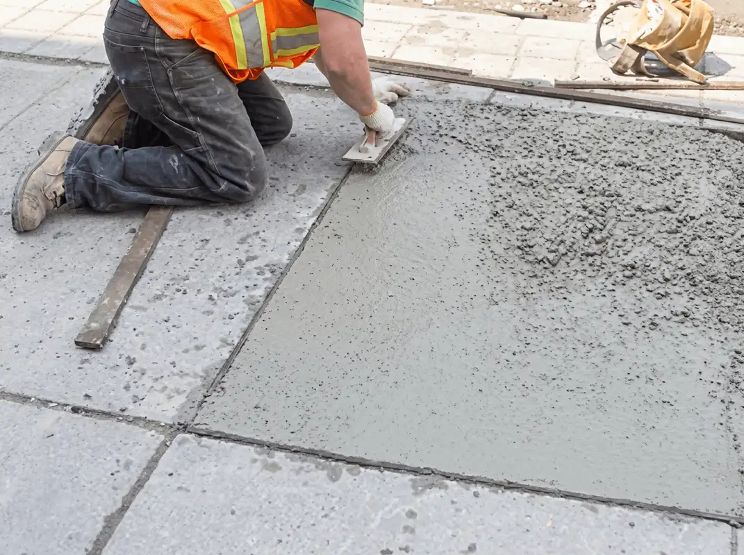 Professional repairing a concrete floor in Scottsdale, AZ